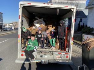 South Boston Youth Hockey Players Volunteer at the Food Pantry